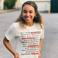 Black woman wearing a wait t-shirt