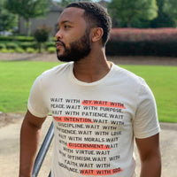 Black man wearing a wait t-shirt