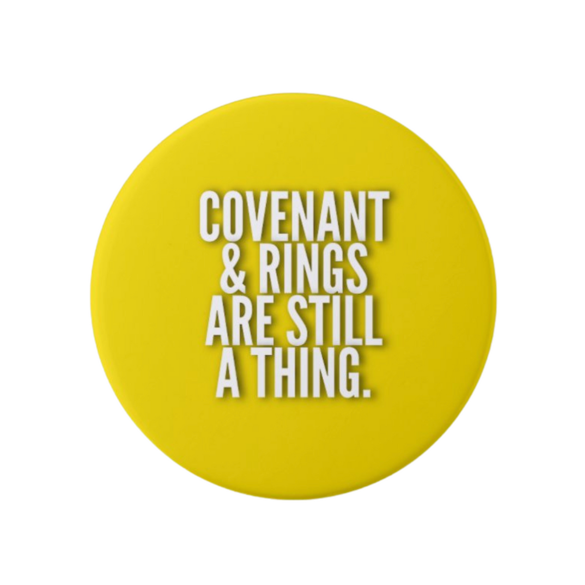 Yellow Christian marriage button with white “Covenant & Rings Are Still A Thing” message