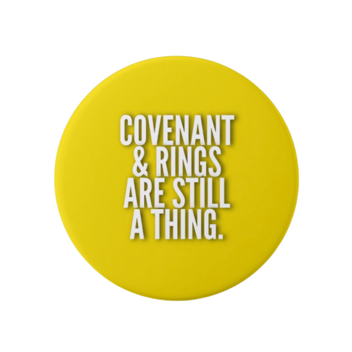 Yellow Christian marriage button with white “Covenant & Rings Are Still A Thing” message